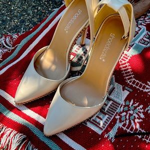 White, gold-studded heels